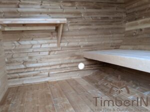 Outdoor hobbit style wooden sauna 34